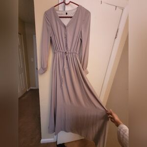 Adjustable dress with pockets.